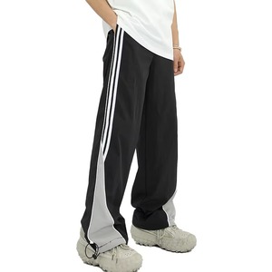 Pantalon de survêtement unisexe en nylon de qualité industrielle avec bandes réfléchissantes, coupe large, coupe-vent, grande taille, idéal pour l'hiver - Product Image 5