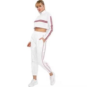 Women's <b>White</b> <b>2</b> <b>Piece</b> Sporty Tracksuit Set Full Sleeve Crop Top Ankle Joggers Red Side Stripes Knitted Polyester Regular Fit - Product Image 1