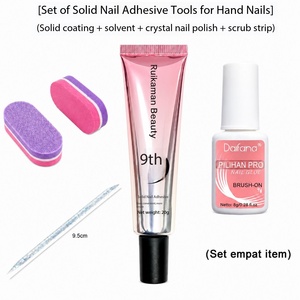Kit d'adhésif solide pour ongles avec colle à appliquer au pinceau et bandes exfoliantes pour le soin des ongles - Product Image 3