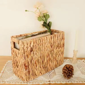 <b>Rectangular</b> wall-mounted <b>basket</b> for magazines and books, woven from natural water hyacinth, for storing household items. - Product Image 1