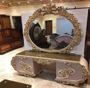 Luxurious <b>gold</b> carved vanity <b>dressing</b> <b>table</b> with a large round mirror and single drawer, available at wholesale prices. - Product Image 3