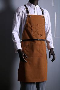 Delantal Profesional de Lona Encerada y Cuero Duradero con Cremallera y Tirantes Cruzados Ajustables para Chef, Barista, Barbero, Carpintero y Herramientas - Product Image 2
