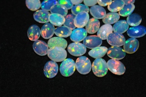 <b>7</b>*9mm White Opal Gemstone Oval Faceted Cut Super Fine Quality - Product Image 3