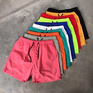 Shorts unisexe à cordon de serrage, couleur unie, séchage rapide, taille mi-haute, décontracté, en polyester tissé, coloris rouge, vert, rose, jaune, noir, fourniture OEM - Product Image 2