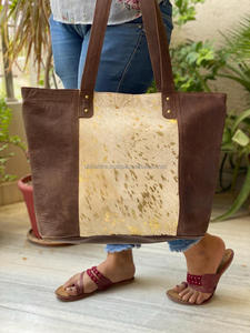 Bolso de mano de piel auténtica metálico con pelo OEM 2024 personalizado del fabricante al por mayor, bolsos de hombro de gran capacidad a la moda para mujer - Product Image 3