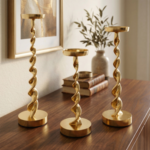 ชุดเชิงเทียนโลหะสีทองแบบเกลียว 3 ชิ้น ดีไซน์เกลียววนสุดพิเศษ สำหรับตกแต่งบ้านหรูหราและงานแต่งงาน ราคาโรงงาน - Product Image 1