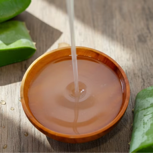 Premium raw aloe vera liquid <b>extract</b> with transparent quality for skincare formulations and bulk beauty applications - Product Image 1