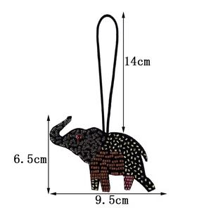 Llaveros de elefante color marrón hechos a mano, vintage, con pedrería, brillantes, multicolor, con letras del alfabeto, iniciales, dijes para muñeca - Product Image 1