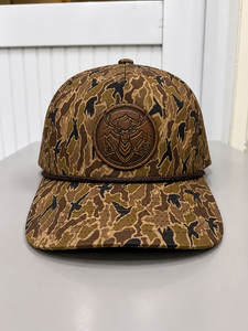 Gorra Trucker de Camuflaje con Parche de Cuero y Logotipo Bordado, Gorra Snapback Personalizada para Deportes al Aire Libre, Fábrica Injae Vina - Product Image 1