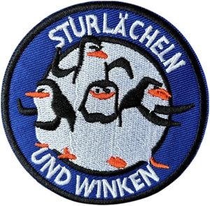 Patch brodé thermocollant « Sturlächeln Und Winken » en feutre non tissé, forme ronde, pour cadeaux - Product Image 1