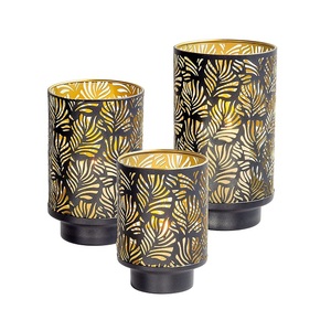 Juego de tres portavelas votivas de forma redonda en hierro, color negro y dorado, para decoración de eventos de boda - Product Image 1