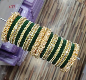 Luxurious New Arrival 2026 Emerald Green Velvet <b>Bangles</b> with Intricate Faux Pearl and Gold Stone Embellishment Chooda <b>Bangle</b> Set - Product Image 1
