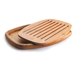 Tagliere ovale per pane con scanalature di drenaggio per uso in cucina - Product Image 1
