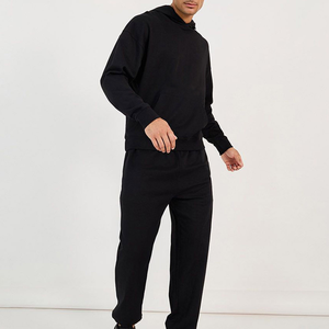 Ensemble survêtement streetwear noir personnalisable unisexe de qualité supérieure, sweat à capuche en molleton 100 % coton, écologique, hiver, grandes tailles - Product Image 2