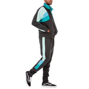 Ensemble de survêtement coupe-vent personnalisé en gros – Joggers décontractés très prisés – Veste coupe-vent d'été en nylon/polyester pour homme - Product Image 2
