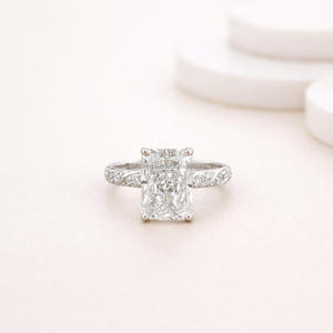 Modern <b>Silver</b> Tone <b>Emerald</b> Cut Style <b>Ring</b> With Brilliant Center And Decorative Side Band For Jewelry Brands - Product Image 1