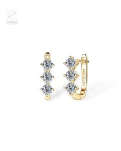 Pendientes Huggie de Oro de 14K con Tres Diamantes, Fabricante de Joyería Fina de Lujo - Product Image 1