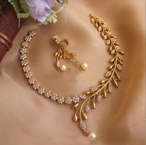 Regal scrollwork gold set including a <b>matching</b> <b>bracelet</b> and statement ring, available at wholesale prices. - Product Image 2