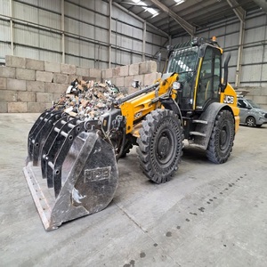 รถตักล้อยางรุ่นพรีเมียม JCB TM420s สร้างขึ้นเพื่อให้พลัง ความเสถียร และความแม่นยำที่ยอดเยี่ยมสำหรับการจัดการวัสดุ - Product Image 1
