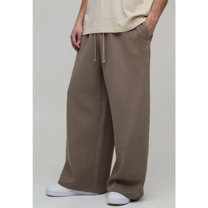 Pantalon large pour homme, tendance, décontracté, couleur unie, taille élastique, ample - Product Image 1