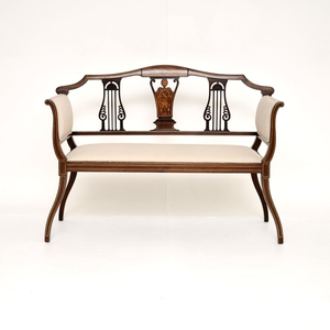 Elegant Antique Style Settee Featuring Traditional Scroll <b>Arms</b> and Decorative Brass Nailhead Trim - Product Image 1