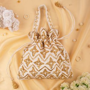 Pochette Potli ronde en soie brodée or blanc faite à la main avec motif floral et perles pour décoration de mariage - Product Image 1