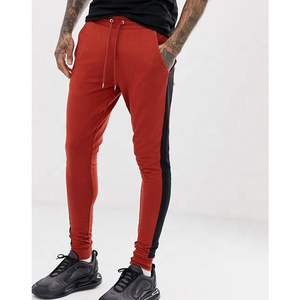 Survêtement à capuche rouge pour homme, manches longues, couleur unie, style sportif avec bandes latérales blanches, fermeture à cordon, coupe classique - Product Image 2