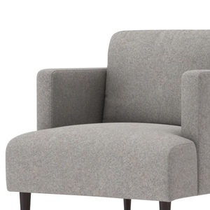 Ce fauteuil Dania présente un design minimaliste moderne et élégant avec un revêtement en tissu gris clair. - Product Image 2