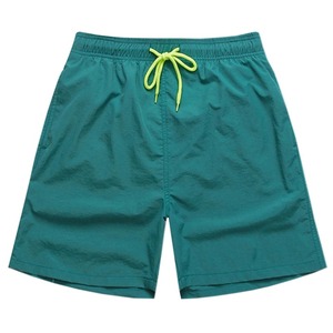 Shorts de bain vert uni pour homme Crown Gate International, taille mi-haute avec cordon de serrage, respirant, séchage rapide, décontracté, coupe classique, idéal pour l'été - Product Image 1