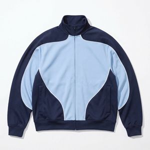Chaqueta deportiva con paneles en azul marino y azul claro — Ribete blanco, cuello alto con cremallera completa |   Ropa Deportiva Premium OEM / Marca Privada - Product Image 1
