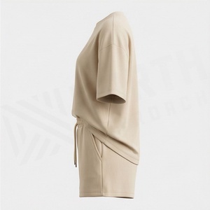 Ensemble décontracté en tricot pour femmes, 2 pièces, t-shirt à manches courtes et short au-dessus du genou, couleur unie, respirant, coupe ample, printemps été - Product Image 3