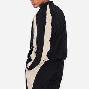 Ensemble de survêtement coupe-vent confortable avec veste et pantalon imprimés à motif uni - Product Image 4