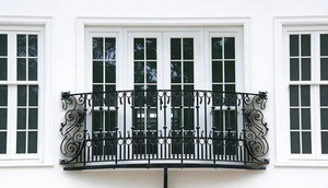 Traditional wrought iron balcony railing featuring intricate patterns and a rust-resistant coating, suitable for outdoor use. - Product Image 4
