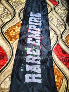 กางเกงวอร์มกันลมพิมพ์โลโก้ตามสั่ง OEM สำหรับผู้ชายและผู้หญิง ผลิตจากโพลีเอสเตอร์กันน้ำ 100% ไนลอน - Product Image 5