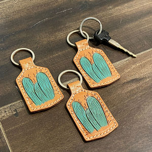 Porte-clés en cuir taillé sculpté à la main Porte-clés en cuir de forme exotique mignon Accessoires en cuir taillé Porte-clés mignons pour unisexe - Product Image 4