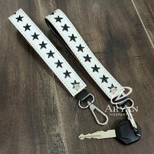 Porte-clés en cuir de vachette véritable fait main, motif étoile, design premium, avec dragonne, pour unisexe - Collection 2026 - Product Image 1