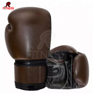 Guantes de Boxeo Premium para Entrenamiento de MMA con Acabado de Cuero Reforzado Antideslizante, Acolchado Protector de Espuma y Cierre de Gancho y Bucle en la Muñeca - Product Image 1