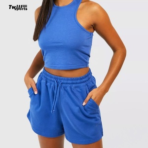 เสื้อครอปคอตั้งทรงสปอร์ตผ้าฝ้ายแท้ 100% พร้อมกางเกงขาสั้นรัดเชือก ชุดออกกำลังกายสำหรับผู้หญิง แห้งเร็ว เป็นมิตรกับสิ่งแวดล้อม บริการ OEM แบบคลาสสิก - Product Image 5