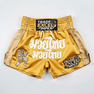 Shorts de Muay Thai pour hommes Trade Excel Impex, dorés, avec broderie frontale et impression sérigraphiée, taille mi-haute, fermeture élastique, style décontracté, séchage rapide - Product Image 1