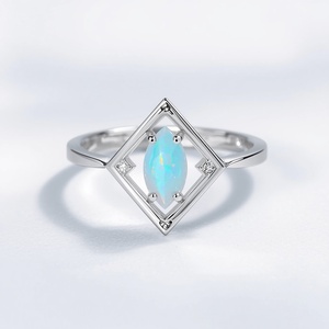 Anillo de Oro Blanco de 9K con Ópalo Azul Corte Marquesa, Marco Geométrico, Fabricante de Joyería Fina Personalizada - Product Image 1
