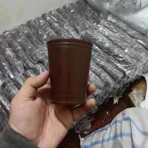 Fabricación de un juego de dados de cuero personalizado con tapa, vaso agitador de cuero marrón para dados. - Product Image 5