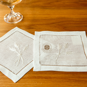 <b>White</b> <b>lace</b>-style embroidered cocktail napkin, classic elegance for weddings and special occasions. - Product Image 1