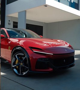 USED F_errari Purosangue is a four-door four-seater performance vehicle <b>powered</b> by a naturally aspirated 6.5-liter V12 engine - Product Image 3