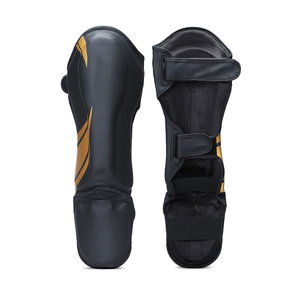 DAWNFROCE Protège-tibias de boxe professionnels légers en PU, noirs avec accents dorés, fermeture auto-agrippante, équipement de protection - Product Image 1