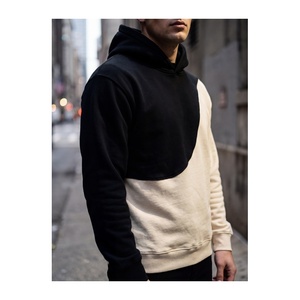 Sudadera con capucha personalizada para hombre, diseño de paneles ondulados en contraste negro y beige crema, forro polar grueso, estilo pullover. - Product Image 1