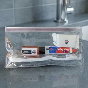 Mini kit de viaje con champú, pasta de dientes, cepillo de dientes y jabón en bolsa de plástico transparente, set de artículos de tocador para hotel - Product Image 4