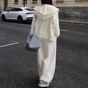 ชุดเซ็ตฮู้ดดี้ออกกำลังกายแบบซิปและกางเกงวอร์มทรงหลวมสำหรับฤดูหนาว OEM 2 ชิ้น ชุดวอร์มผู้หญิงสไตล์วินเทจแบบเรียบๆ สำหรับสกรีนลายพิมพ์พัฟฟ์ - Product Image 2