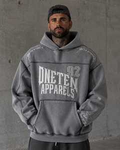 เสื้อฮู้ดโอเวอร์ไซส์ผ้าฟลีซหนานุ่มสำหรับผู้ชาย ยี่ห้อ ONETEN APPARELS สีเทา สไตล์สตรีทแวร์ พิมพ์ลายโลโก้ด้านหน้า มีกระเป๋า - Product Image 1