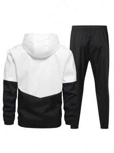 Ensemble survêtement 2 pièces pour homme, veste à capuche zippée et pantalon coupe-vent, motif chevron color block blanc et noir - Product Image 1