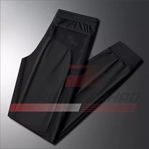 Pantalon long décontracté de sport pour homme, grande taille, avec logo personnalisé OEM, coupe droite, en molleton, séchage rapide - Ahmad Fahad Industry - Product Image 3